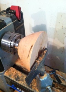 Once in the chuck, it's quick work to clean up the sides.  This isn't the shape I was hoping for, but the wood dictates what it is sometimes, especially when using mostly rotten firewood. 