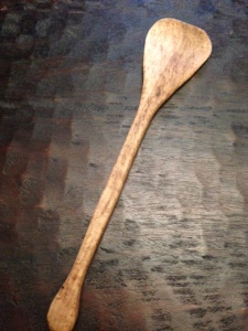 This is a kitchen spoon spatula hybrid made out of bird's eye maple